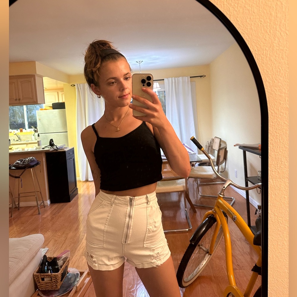 High waisted, white ripped shorts